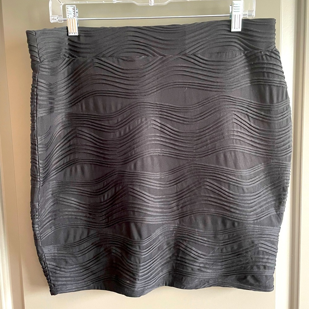 Cute Jennifer Lopez black mini skirt